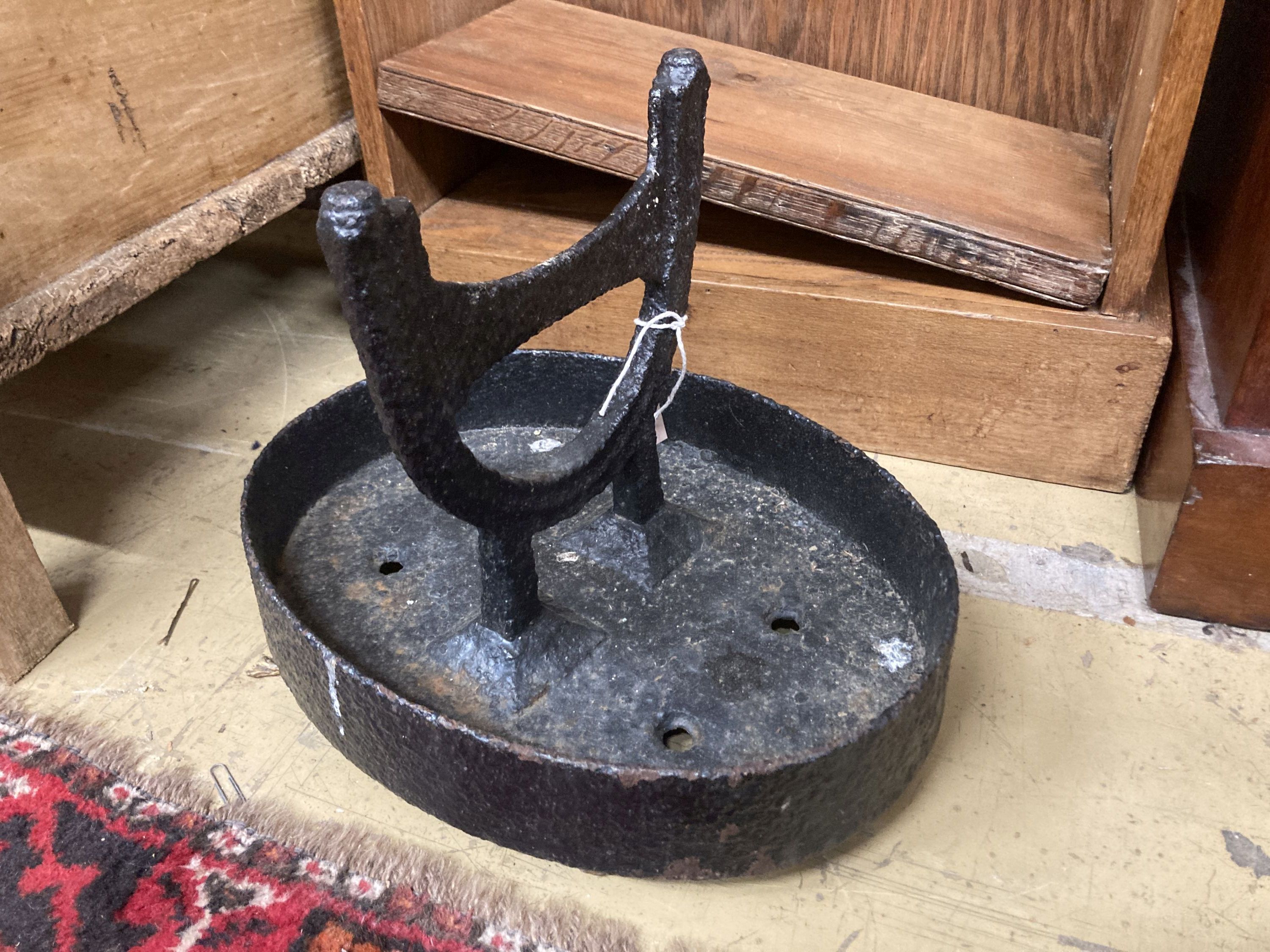 A Victorian cast iron boot scraper, 33 x 25cm